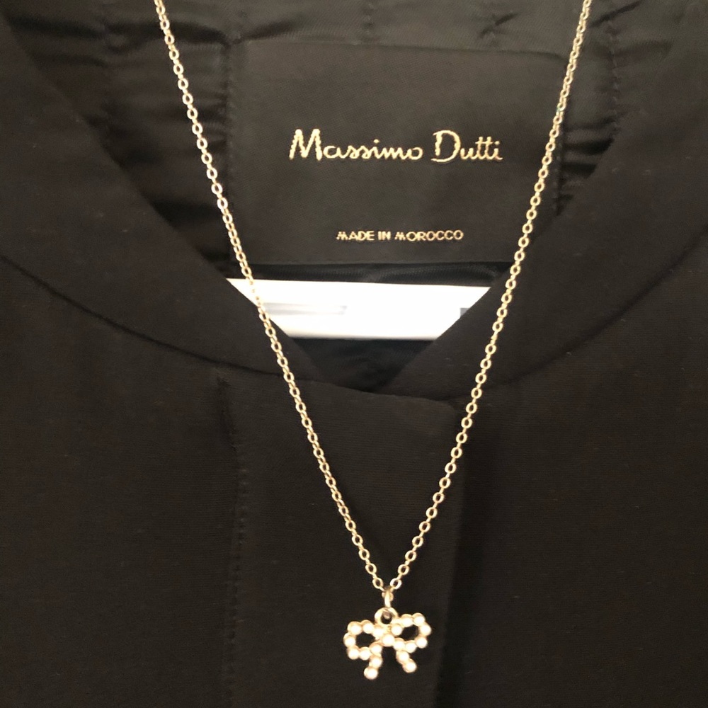Bow tie necklace on gold chain